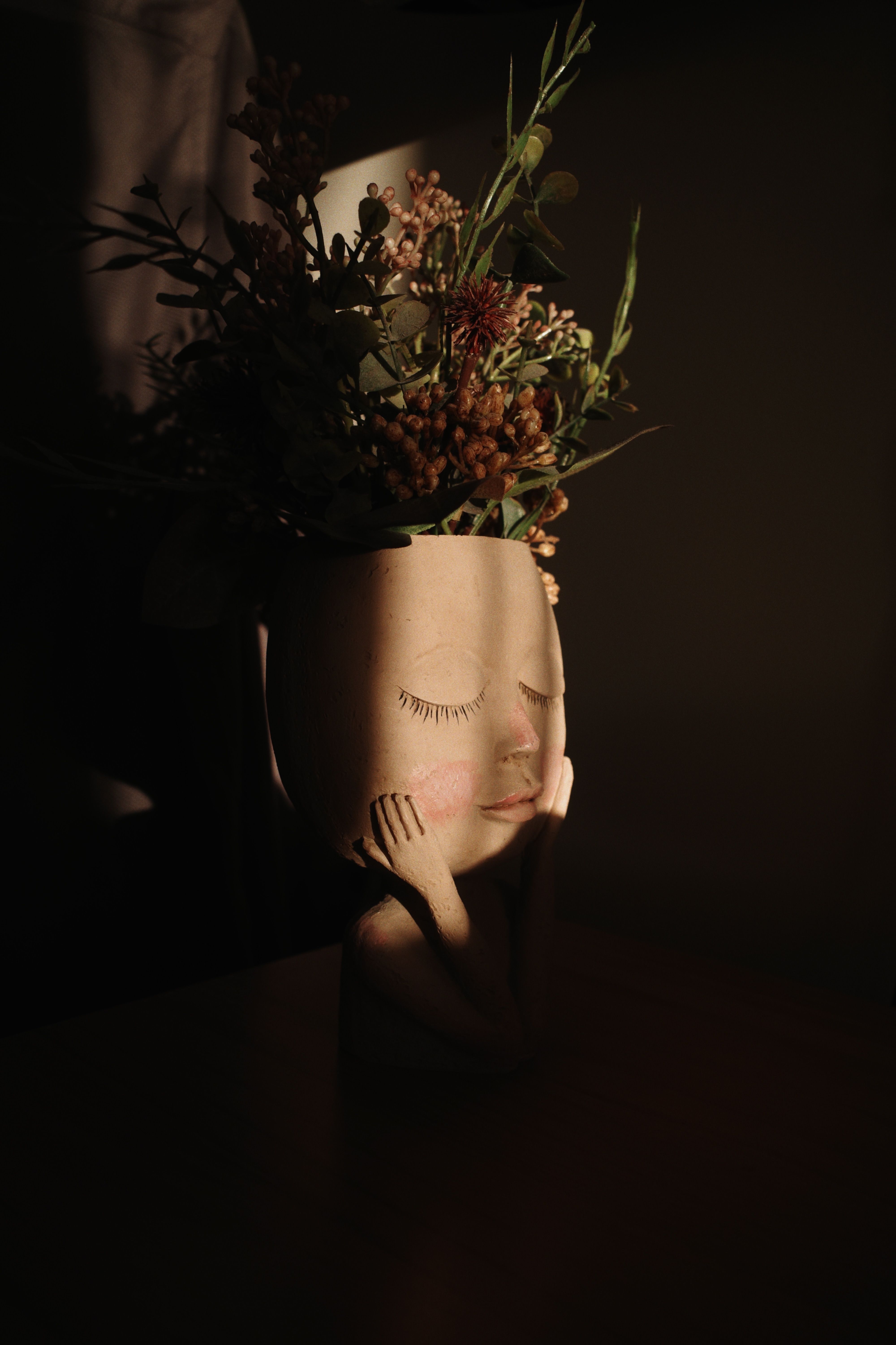 Vaso artístico com flores